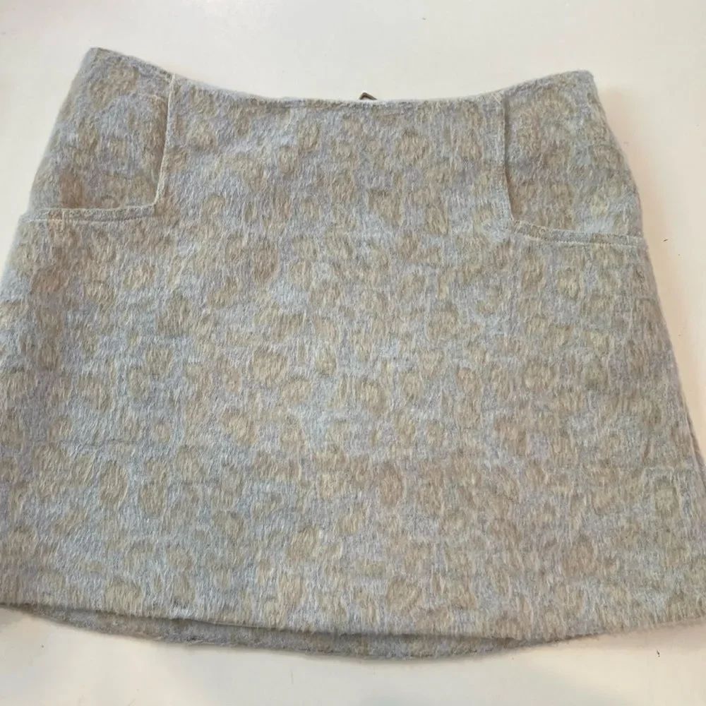 URBAN OUTFITTERS ECOTE SNOW LEOPARD MINI SKIRT W/Pockets $69
